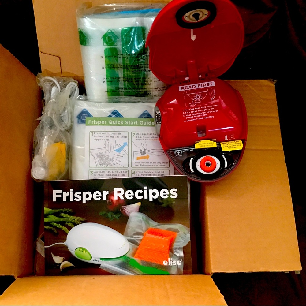 Oliso crisper FF-600 complete brand new w/bags and recipe book vac food sealer.